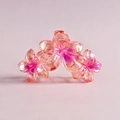 Detail of pink gradient resin flower hair claw clip with transparent 3D petals - 1# Gradient Pearlescent Pink Plumeria
