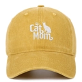 Close-up of Cat Mom embroidery and cat silhouette on washed yellow cotton baseball cap - Yellow