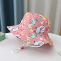 Detail of pink cotton sun hat with dinosaur prints and adjustable drawstring for kids - Size 52 Approx. 2-5 Years / Pink Forest Dinosaur