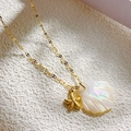 Marine style 18K gold plated necklace with iridescent white shell and starfish charms - Starfish Style