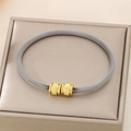 Minimalist silver braided wire bangle with dual gold textured beads for women - Two-tone Gold and Silver (KB187717-XY)