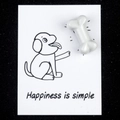 White bone-shaped natural crystal stone on 'Happiness is simple' healing card - Porcelain White