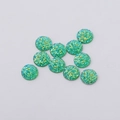 Macro shot of 12mm green resin flatback rhinestones with sparkling druzy texture - 12mm / Green (2)