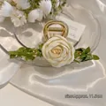 Cream satin rose hair claw clip with green leaves on gold metal base, 11.5cm size - Flower Vine Claw Rose