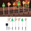 Solar Christmas path lights featuring Santa, tree, and reindeer cartoon characters - Santa Tree Reindeer (Transparent Tube)