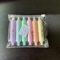 6-piece mini sausage highlighter set in transparent zipper pouch on dark wood - Sausage