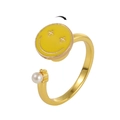 Rotating daisy ring with yellow smiley face and pearl detail for stress relief - Smile Pearl Row