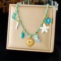 Detail of gold pendant necklace with light blue woven rope and colorful charms - Boot Sun Starfish Moon Chili Pendant Style (N3701)
