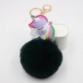 Detalle de llavero de unicornio con pompón verde oscuro y anillo de metal en color oro - Verde Oscuro