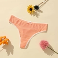 Pinkish orange thong with breathable vertical ribbed texture and white lace trim - Orange