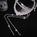 Elegant silver star hair chain with clear crystals shown on a dark vintage background - 1pc 2 Chains (Faux Crystal Tassel)