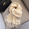 Creamy white 100% Australian wool scarf featuring long fringe tassels and soft texture - White