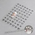 5D embossed nail sticker MO-269 featuring black bow designs with small crystal accents - Crystal Diamond Black Bow / MO-269