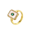 Detail view of 18K gold plated ring with white mother of pearl and green center gemstone - Oval Green Zirconia Ring
