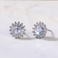 Elegant silver flower stud earrings with sparkling zircon stones on marble - Sunflower Radiating