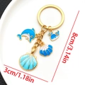 Blue and white enamel sea creature keychain with dolphin whale and seashell charms - Lake Blue Shell Dolphin Keychain-LS560