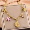Collana dorata a tema marino con ciondoli a forma di stella marina, conchiglia e cuore - Conchiglia