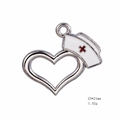 Silver heart pendant with white enamel nurse hat design and red cross detailing - Nurse Hat