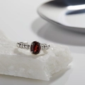 Macro shot of S925 silver ring with oval garnet gemstone and side accent stones - Natural Garnet Simple Ring LR263