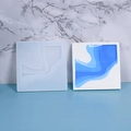 Macro view of square wave pattern resin mold with blue layered ocean effect sample - Style 02