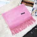 Classic soft pink cashmere scarf with elegant fringe trim and a minimalist label - Baby Pink