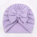Detail of lavender baby turban featuring a large bow and soft herringbone knit texture - One Size / Purple