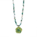 Macro detail of natural stone beads and green floral pendant on Cuban chain necklace - Green Marbled Beaded Flower Necklace (Style 2)