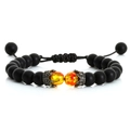 Dettaglio di perle nere opache e ciondolo a corona con pietre arancioni sul bracciale - Stile-03 Pietra opaca