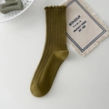 Olive green knit crew socks with delicate ruffled edges shown in a flat lay view - One Size / Army Green