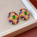 Macro detail of vintage gold-plated enamel earrings with green oval gemstones and zircons - Vintage Enamel Green Gemstone Stud Earrings (925 Silver Pin)