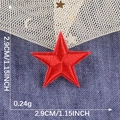 Red embroidered star patch for clothing with adhesive backing measuring 2.9cm x 2.9cm - Red