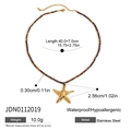 Collier de perles en acier inoxydable avec pendentif étoile de mer dorée et perles brunes - Étoile de Mer Perles Brunes (JDN0112019)