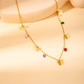 Detail of gold-plated necklace featuring butterfly charms and colorful zircon stones - Faceted Beaded Butterfly Necklace