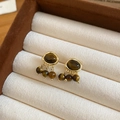 Close-up of vintage tiger eye stone earrings with gold tassels in a jewelry box - 43# Silver Earring Post - Gold Coffee