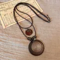 Etnische vlinderketting met donkere houten hanger en spiraalvormige metalen inleg - 3# Goud Bruin Rond
