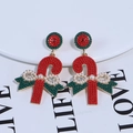 Detail of Christmas candy cane earrings with hand-woven seed beads and pearl bow - Red Beaded Candy Cane With Bow