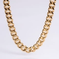 Close-up of a high-polished golden stainless steel Cuban link chain with detailed flat links - 10.5mm Gold