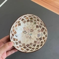 Detail of coconut shell bowl with inlaid mother of pearl and abalone shell patterns - Brown Shell Lucky Clover