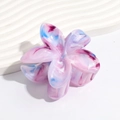 Detail showing marble texture on flower hair claw clip with pink and blue gradient - Gradient Purple