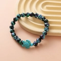 Unisex bead bracelet with black-green patterned beads and turquoise sea turtle charm - Blue Green Black Splatter Turtle Bracelet