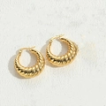 Chic 14K gold plated geometric twist hoop earrings with a polished textured finish - Twill Hollow Earrings Gold