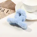 Fluffy light blue faux fur hair claw clip for women on a stylish magazine background - 9cm Plush Cross - Sky Blue