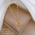 Detailed view of fox pendant necklace in a warm gift box with silk fabric padding - 1.8x1.2cm Pendant / 45cm Chain Length / Gold