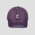 Detailed shot of white embroidered C letter on washed purple denim baseball cap - M (56-58cm) / Purple