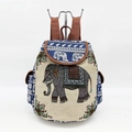 Ethnic style canvas backpack featuring elephant pattern embroidery and adjustable brown straps - Brocade Jacquard Elephant