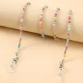 Macro shot of colorful faceted crystal beads eyewear chain with silver lobster clasps - Colorful