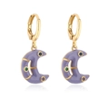 Detail of bohemian gold-plated moon earrings with purple enamel and zircon inlay - Purple
