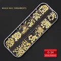 12-grid nail art kit with gold alloy ocean shapes like starfish and shells in a clear box - G-34 Style (Golden Ocean Theme Metal Sheets)
