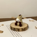 Close-up of hand-carved wooden animal sculpture on a rustic wood slice base - Horse (Small) / Height approx 4cm