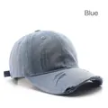 Vintage blue distressed denim baseball cap with frayed hole details and adjustable strap - Blue